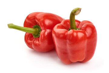 Red ripe bell peppers, isolated on white background