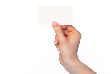 Obraz premium Beautiful female hand holding white business card on white background
