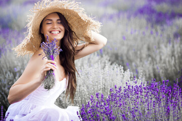 Close up portrait of beautiful young woman in lavender field.