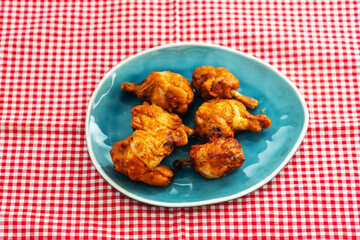 delicious fried chicken wings with sauce
