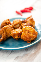 delicious fried chicken wings with sauce