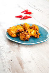 delicious fried chicken wings with sauce