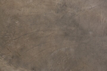 fondo abstracto con manchas grises sobre suelo de cemento