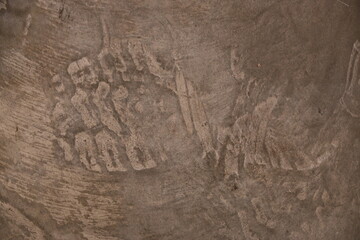 fondo abstracto con manchas grises sobre suelo de cemento