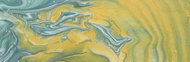 art photography of abstract marbleized effect background. Gray and gold creative colors. Beautiful paint.