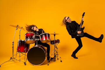 Full length photo crazy funky two people popular rock band artist play composition night club...