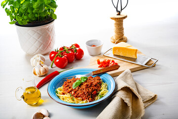 Delicious spaghetti bolognese on white background