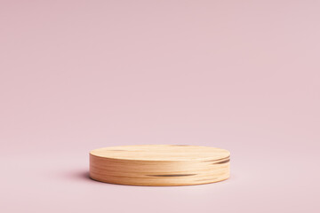 Wooden product display or showcase pedestal on pink background with cylinder stand. Pink studio...