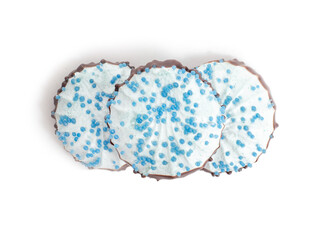 Blue coconut marshmallows with chocolate on a white background, isolate, delicious
