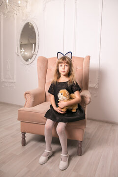 Little beautiful girl with cat ears. Copy space.