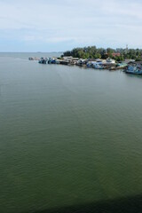 Fototapeta premium Viewpoint from Prasae Sin Bridge See the mouth of the river into the Thai sea in Rayong Province