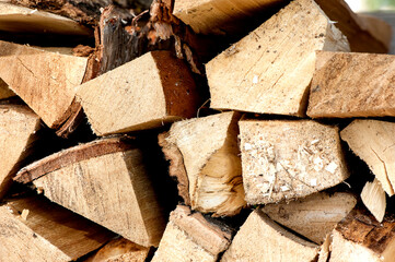 chopped wood in a woodpile. Wood texture. Close-up