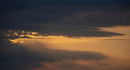 Landscape. Sunlit cloudy sky. Sunset