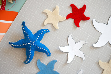 Fototapeta na wymiar DIY instruction. Step by step tutorial. Making Summer decor - wreath of rope with sea stars made of felt. Craft tools and supplies. Step 2
