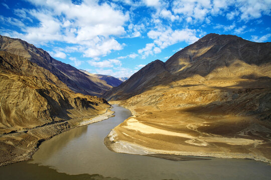 Confluence of the Indus and Zanskar Rivers are two different colors of water , between Kargil and leh,India