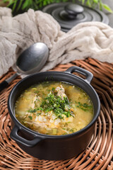 Barley soup with vegetables and chicken.