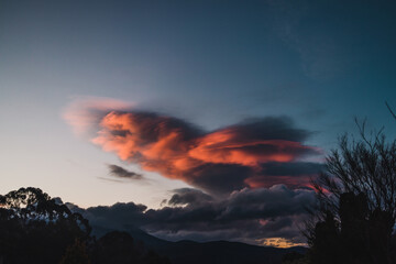sunset sky with beautiful clouds over the hills of Tasmania