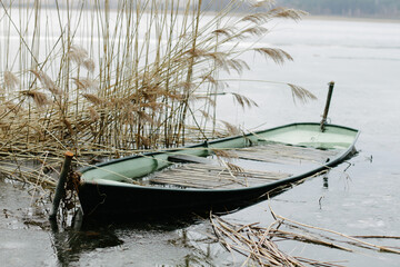 boat on the lake, broken, under water