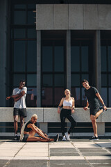 Runners relaxing after workout