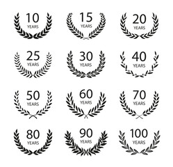 Set of anniversary laurel wreaths. Black and white anniversary symbols. 10, 15, 20, 25, 30,40,50,60,70,80,90, 100 years. Template for award and congratulation design. Vector illustration.