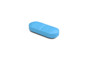 Single blue pill isolated on white background. 