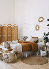 Comfort bedroom in boho style interior with lovely furnishing