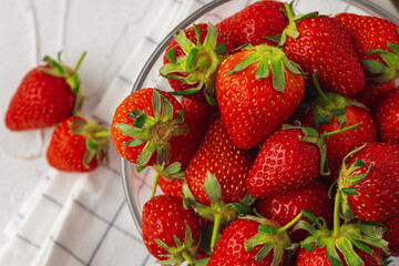 Red ripe fresh strawberry with leaves close up