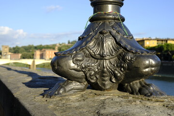 Lamppost at the river Arno in Florence
