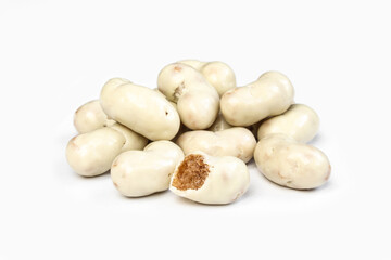 Peanut flips covered in white milk chocolate. Group of Tasty sweets isolated on white background