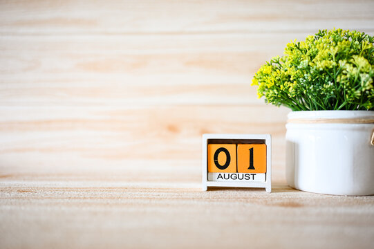 01 August Wooden calendar with Concept Start Hello August