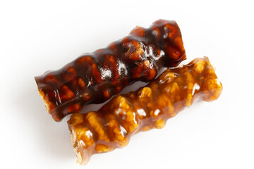 Walnuts on a string dipped in starch grape molasses. Churchkhela. Walnut sujuk.