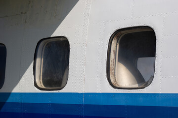 Fototapeta na wymiar windows portholes in an airplane