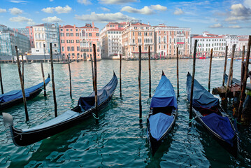 Fototapeta na wymiar Canal with gondolas in Venice, Italy.