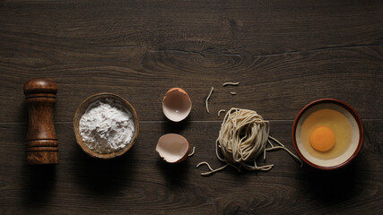 Raw Asian Homemade Noodle with Eggs, Salt, Egg Shell, and Flour, Copy Space for Wallpaper or Backgrounds