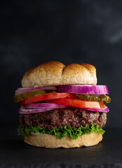 Juicy Grilled Hamburger on Whole Grain Bun