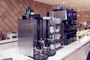 Super automatic coffee machines and hot water dispensers, airport lounge, toned