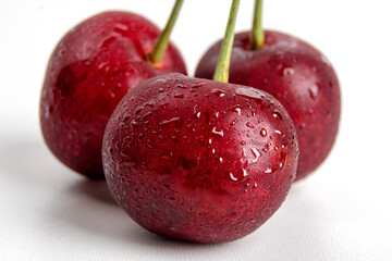 Juicy Cherry on white background. Food concept. Healthy eating. Copy space for design.