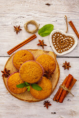 Homemade cupcakes with cinnamon, star anise and fresh mint. Autumn good mood, warm weather