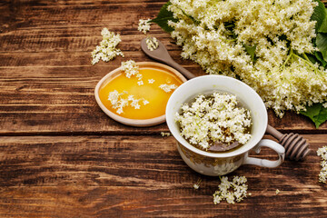 Tea from fresh elder flowers. Hot drink, honey, alternative medicine