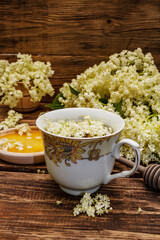 Tea from fresh elder flowers. Hot drink, honey, alternative medicine