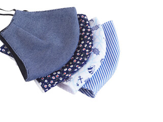 Blue tone fabric face mask to prevent pollution and viruses. DIY handmade from cotton muslin...