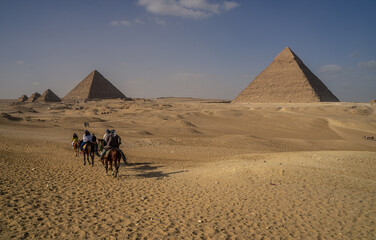 Fototapeta na wymiar Horse ridding near Giza Pyramids