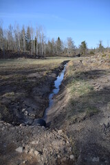 Drainage ditch in countryside