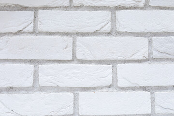 white plasterboard trim with brick pattern close-up