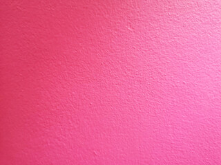 surface of the cement wall is rough, paint pink color texture material concrete background