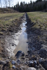 Drainage ditch in countryside