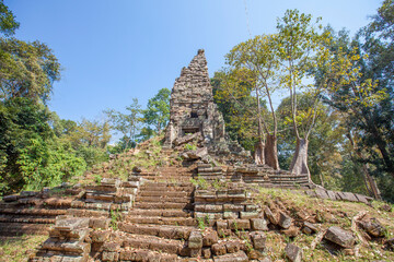 Ancient Preah Palilay temple in Angkor Thom and huge Banyan trees. Angkor, Cambodia.