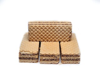 Vanilla wafers isolated on white background. Wafers filled with chocolate and vanilla cream. Crunchy dessert.