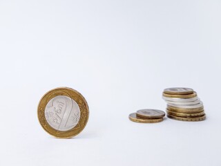 Belarusian coins on a white background of copper and alloys of metals. Folded with a stack. Saving. Stock for a rainy day.