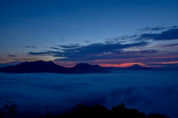 Fototapeta na wymiar Morning mist on a high peak